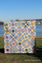 Load image into Gallery viewer, Create stunning movement with minimal effort using this strip pieced, modern quilt pattern. The Irish Vortex is great for beginners!