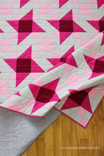 Load image into Gallery viewer, The Irish Vortex quilt is a stunning star-meets-Irish-chain pattern you can finish with fat quarters! Includes 8 quilt sizes in a PDF download.