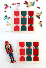 Load image into Gallery viewer, Need a cheerful Christmas sewing project? Try this beginner-friendly quilt block pattern inspired by traditional Christmas crackers! #HolidayCrafts #QuiltIdeas