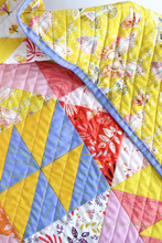 Load image into Gallery viewer, Quilt texture on the baby Pink Lemonade quilt featuring Aerial paired with Ruby and Bee solids. Grab your favorite FQ bundle and dive into a fun quilt adventure #babyquilt