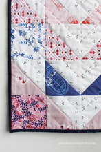 Load image into Gallery viewer, Stitch up a statement with this modern quilted table runner! Featuring the Sonata fabric line in 10 vibrant colours, this Aztec-inspired design is enhanced with both hand and machine quilting for a beautifully textured finish.