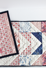 Load image into Gallery viewer, This eye-catching quilted table runner combines traditional and modern with hand and machine quilting! Made using the 10-colour layout of the Modern Aztec pattern and the Sonata fabric line, it’s a fresh, artistic addition to any modern home.