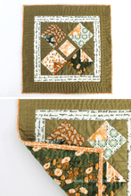 Load image into Gallery viewer, Sew a stylish quilted pillow or mini wall hanging in just one afternoon! This beginner-friendly pattern uses HSTs, flying geese, and snowballs.