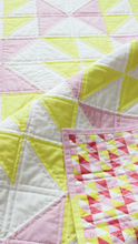 Load image into Gallery viewer, Pink Lemonade quilt pattern is an easy modern quilt pattern with 5 quilt sizes to choose from: baby , lap, double and queen. #modernnursery #quilting 