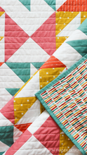 Load image into Gallery viewer, Mix up the fabric selection for a fun and colorful version of the Pink Lemonade Quilt Pattern.