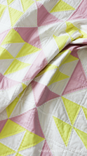 Load image into Gallery viewer, Modern and sweet baby girl quilt using the Pink Lemonade quilt pattern. Personalize your nursery décor with the beginner friendly quilt pattern.