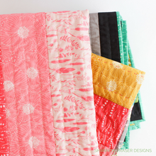 Load image into Gallery viewer, The Reverberance quilt is a colorful modern quilt pattern that's and easy for a beginner. Helps you practice cutting and piecing long strips. Play around with the colors to make the design your own. A full page coloring page helps you plan out your colourway. #modernquilting #quiltpattern #logcabinquilt