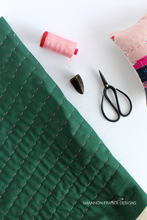 Load image into Gallery viewer, Hand quilted back panel of the Shattered Star lumbar pillow | modern pattern | Shannon Fraser Designs #handquilted