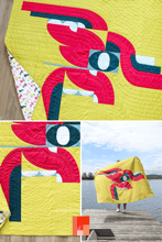 Load image into Gallery viewer, The abstract clouds in this Cloud Surfing quilt create a design that keeps your eye moving across the surface. Deep raspberry and teal anchor the composition, while soft blue and Olive Oil yellow-green add contrast, light, and a wonderfully joyful glow.
#ModernQuilt #QuiltDesign #ColourfulQuilts #CurvedPiecing #QuiltArt