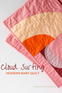 Modern, minimal, and perfect for the nursery—the Cloud Surfing Quilt baby size adds gentle motion and style to any space. Featuring oval Drunkard’s Path blocks in an abstract, wave-like layout, it’s ideal as a baby quilt or a stunning wall hanging for a modern nursery. #ModernBabyQuilt #CloudSurfingQuilt #NurseryWallHanging #CurvedPiecing #MinimalistQuiltDesign