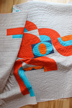 Load image into Gallery viewer, Discover a fresh take on curved piecing with the Cloud Surfing Quilt Pattern. This modern quilt uses oval Drunkard’s Paths to create a sense of sweeping motion—perfect for adding rhythm and artistry to your next quilting project. #CloudSurfingQuilt #ModernCurvedPiecing #AbstractQuiltPattern #ContemporaryQuilting #DrunkardsPathVariation