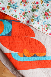 The Cloud Surfing Quilt Pattern blends modern minimalism with organic curves. Its unique oval Drunkard’s Path blocks form abstract, wave-like motifs that evoke movement and energy. Ideal for confident beginners and design-driven quilters alike. #ModernQuiltInspo #QuiltWithCurves #CloudSurfingPattern #OvalDrunkardsPath #MinimalistQuiltDesign
