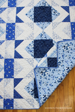 Load image into Gallery viewer, Create a stunning statement quilt with this modern Aztec quilt pattern! Designed for 10 fabrics, this version features the Bequest line in a rich, all-blue palette. Small-scale prints add dimension and visual interest—perfect for fat quarters or curated bundles. Ideal for confident beginners and modern quilters alike!