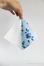 Load image into Gallery viewer, Modern meets tradition in this bold Aztec quilt pattern! Featuring 10 fabrics in a gradient of blues from the Bequest fabric collection, this design shines with depth and texture thanks to small-scale prints. Great for curated fabric bundles or stash-busting your favorite low-volume prints.
