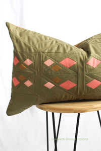 Moss green and coral lumbar Guiding Lights Pillow | Modern quilt pattern by Shannon Fraser Designs includes instructions for both a square and lumbar style