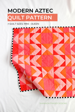 Load image into Gallery viewer, Brighten your day with the Ode to Coral version of the Modern Aztec quilt! Featuring warm shades of coral, pink, and orange in a glowing ombré layout, this quilt is perfect for showcasing bold prints and gradient color stories. A showstopper for modern quilters!