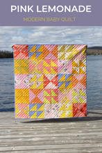 Load image into Gallery viewer, Pink Lemonade modern baby quilt shown in Aerial paired with Ruby and Bee solids for a fun girly baby quilt #babyquilt #modernquilt #quilting
