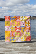Load image into Gallery viewer, Pink Lemonade Quilt out in the wild. Shown here is the fat quarter friendly version. Choose between 3-colour, 5-colour or FQ friendly options #quiltsinnature #modernquiltpattern