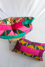 Load image into Gallery viewer, Modern quilted pillow pattern for confident beginners. The Shattered Star Lumbar Pillow uses easy HSTs and a simple zipper install, and quilters love the clear instructions—“Very detailed instructions, would recommend!” A fast, stylish home‑decor project that’s perfect for colour play and cozy texture.