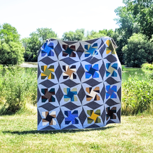 Load image into Gallery viewer, Spinning Snowflakes quilt the fat quarter friendly one in the summer wild