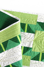 Load image into Gallery viewer, Quilting detail on the green ombré Shattered Star quilted table runner featuring 28wt Aurifil Thread | Beginner friendly modern quilt pattern | Shannon Fraser Designs #quilting