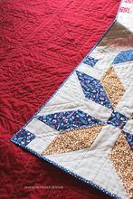 Load image into Gallery viewer, Winter Star Quilt Pattern by Shannon Fraser Designs shown here in Forest Talk fabric collection by Cathy Nordstrom paired with Essex Linen. Machine quilted with Aurifil Thread in 50wt + big stitch hand quilted in pearl cotton thread for extra texture. #starquilt